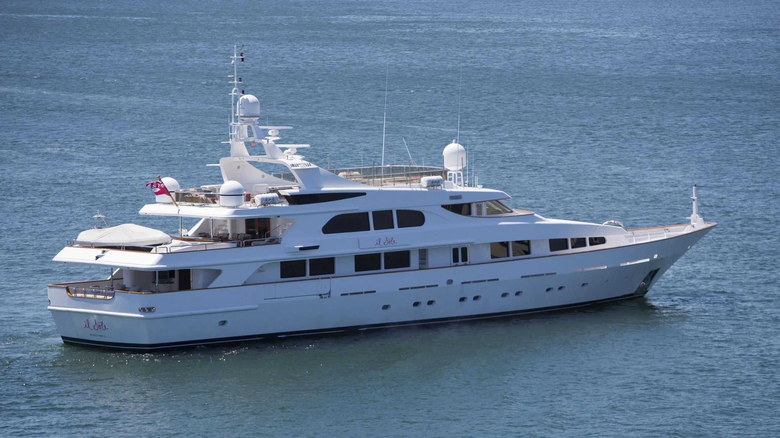a white yacht in the water aboard IL SOLE Yacht for Sale