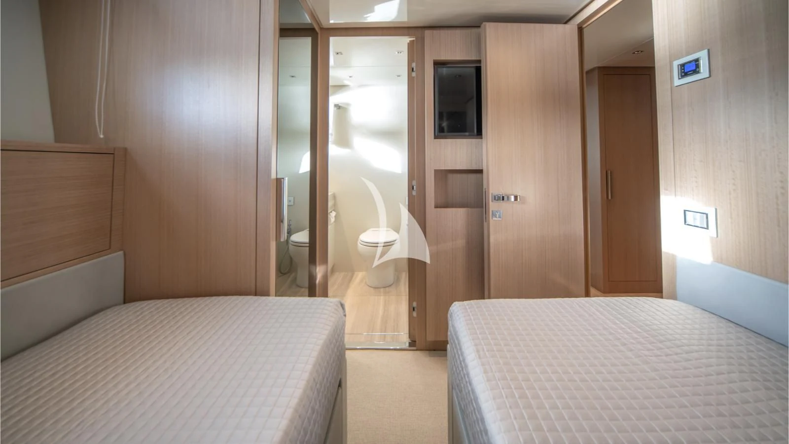 a hotel room with a bed and a door aboard SQUALO Yacht for Sale