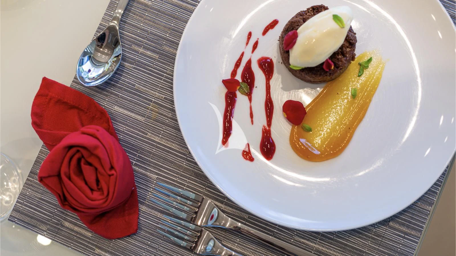 a plate with food on it aboard SQUALO Yacht for Sale