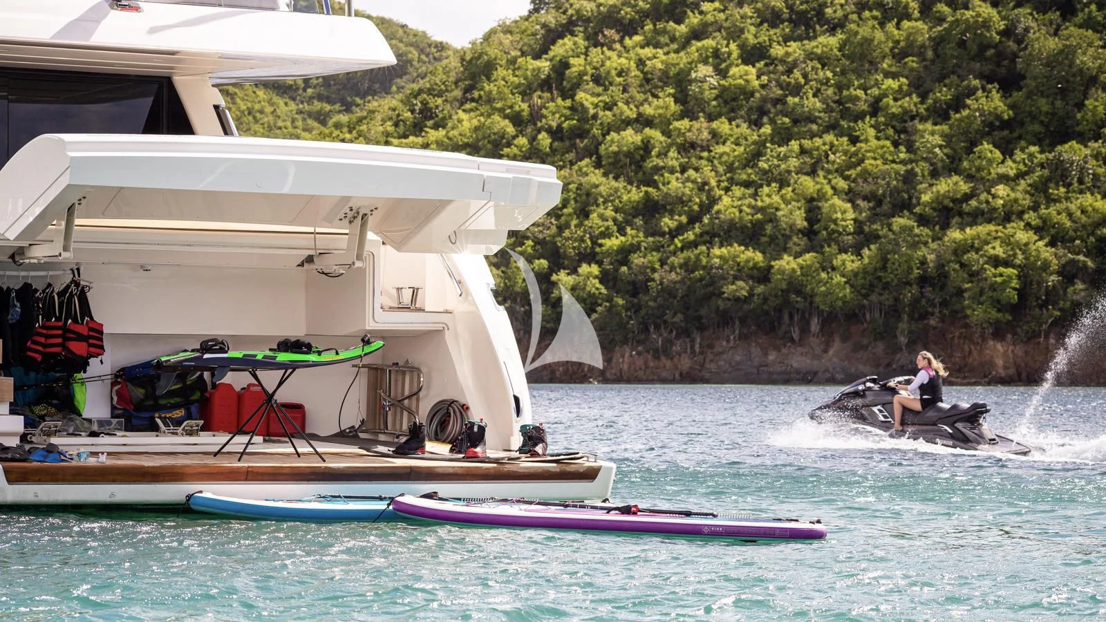 a person on a jet ski aboard SQUALO Yacht for Sale