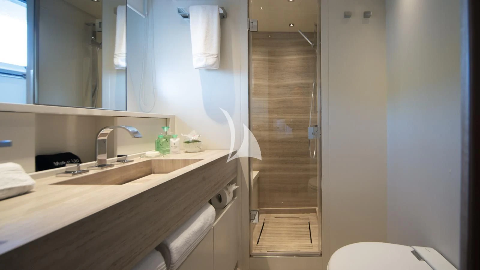 a bathroom with a sink and a shower aboard SQUALO Yacht for Sale