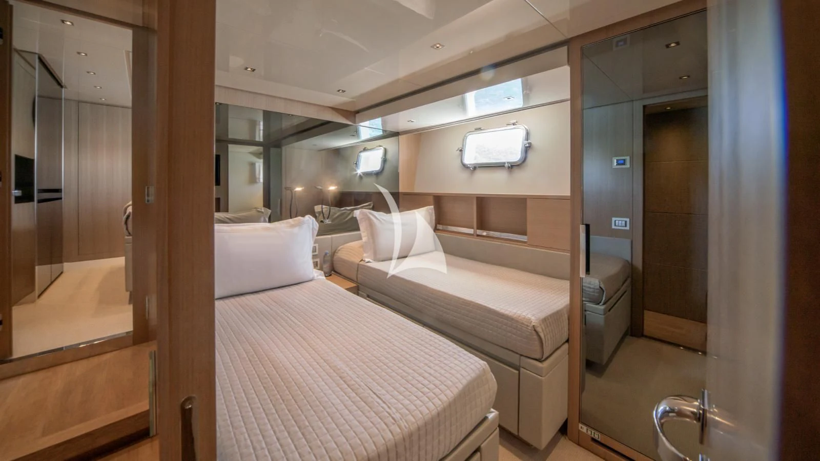 a room with a bed and a mirror aboard SQUALO Yacht for Sale