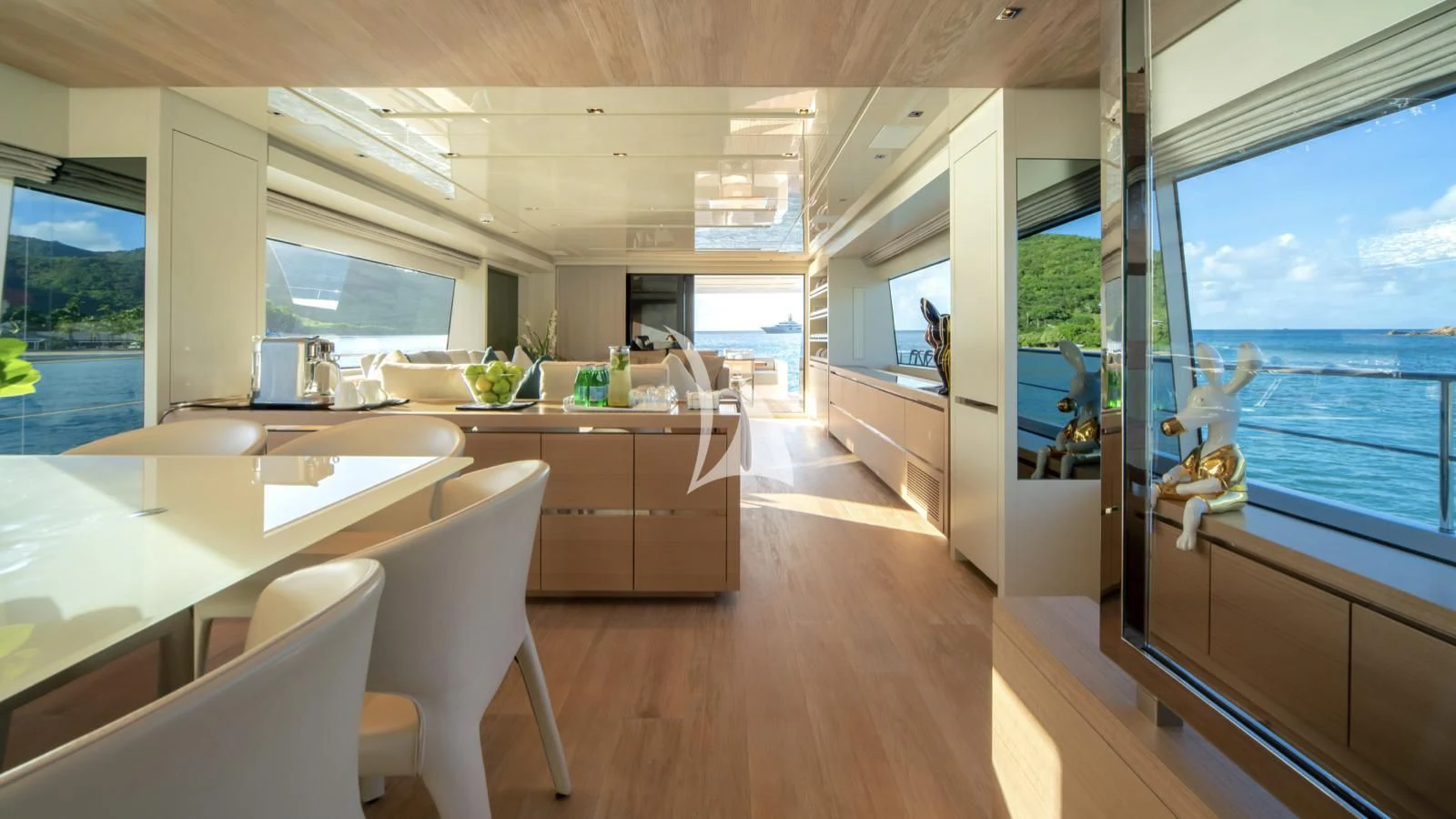 a modern kitchen with a large window aboard SQUALO Yacht for Sale