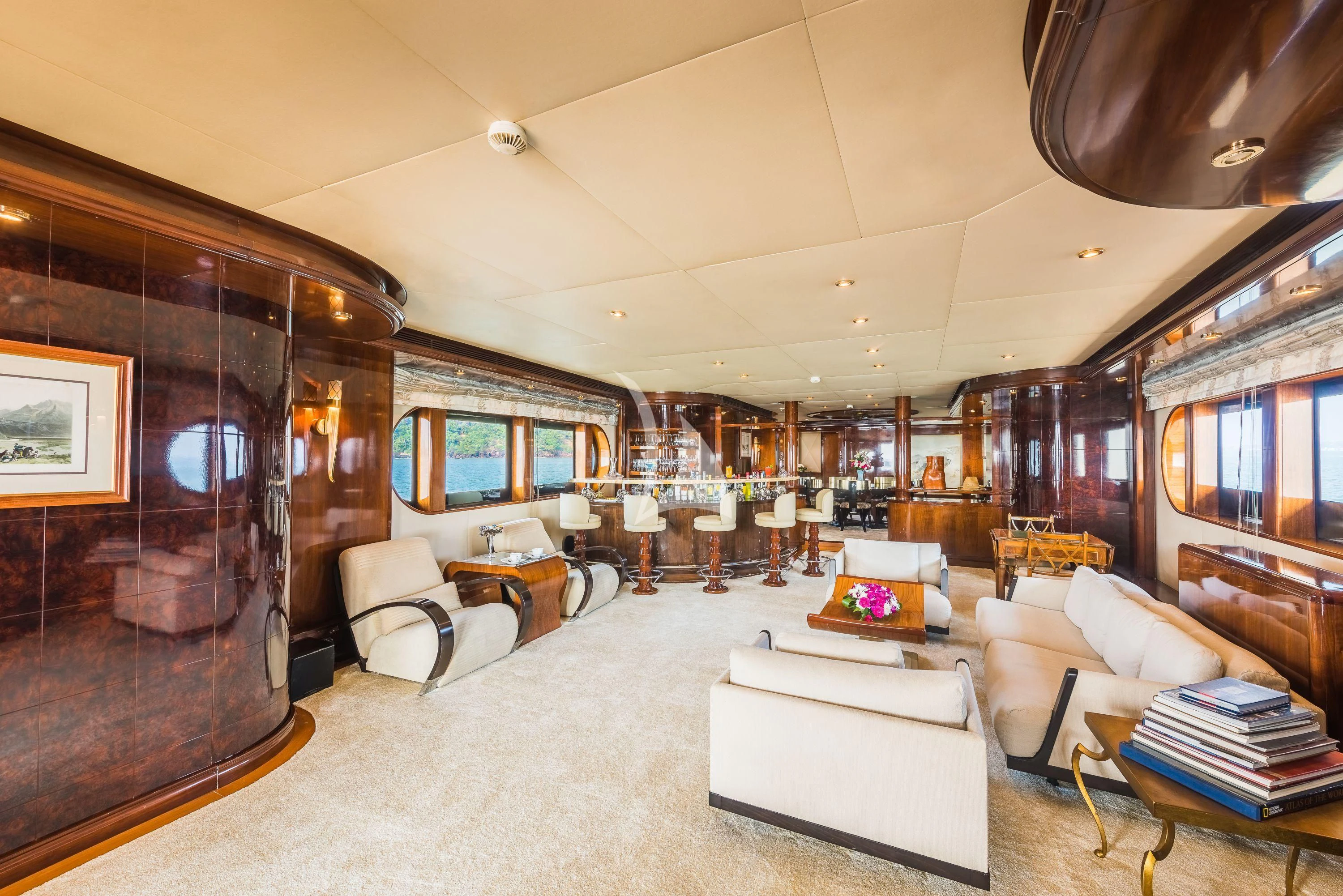 a living room with a large screen aboard ASHENA Yacht for Charter