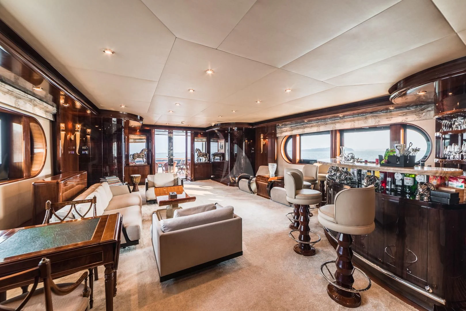 a living room with a large window aboard ASHENA Yacht for Charter