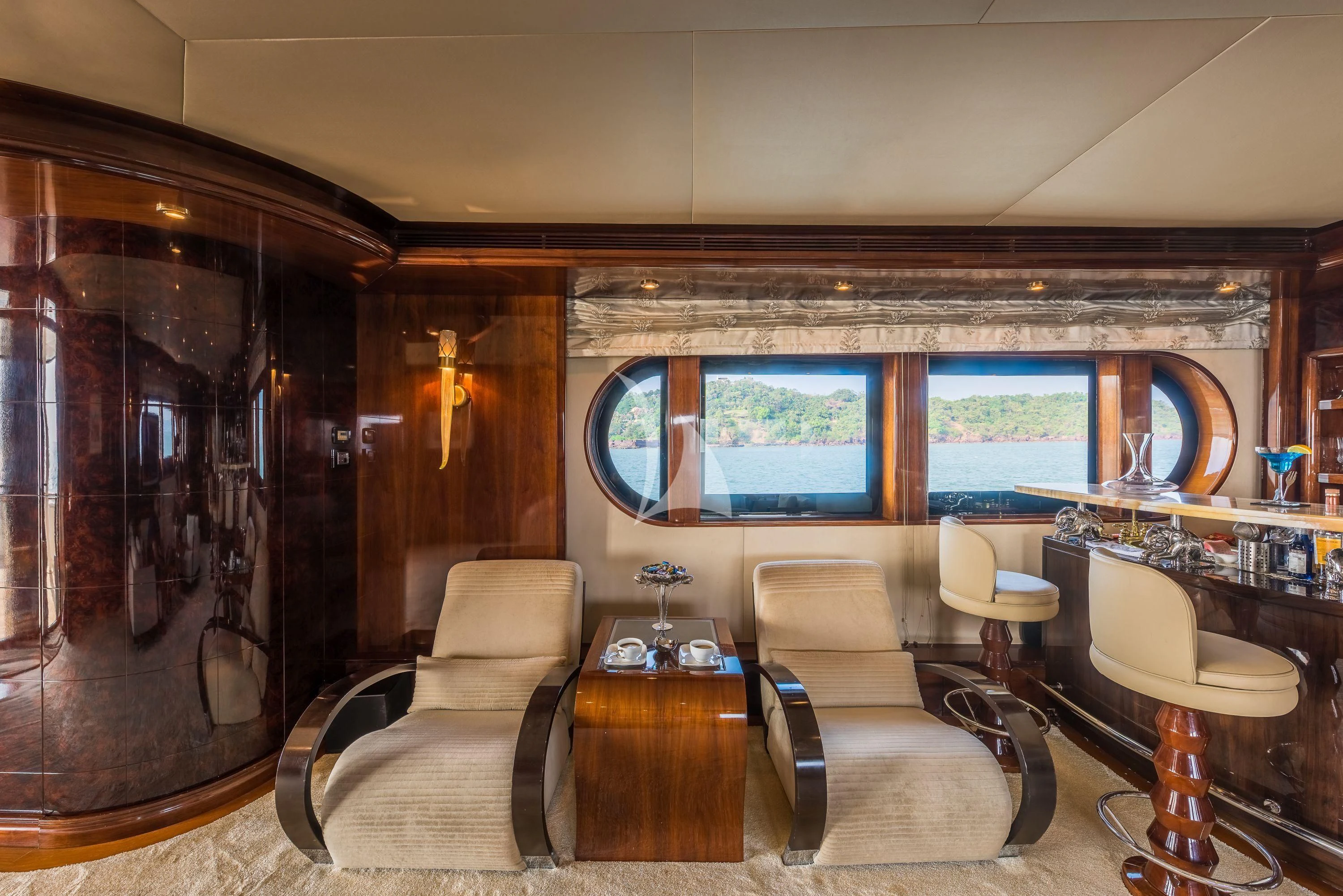 a room with a large window aboard ASHENA Yacht for Charter