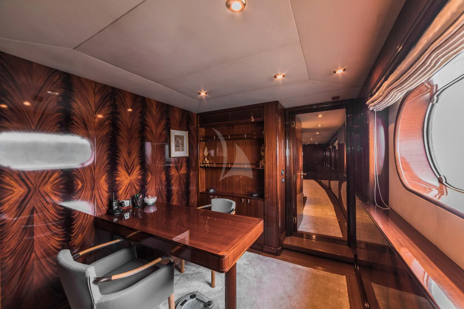 a room with a table and chairs aboard ASHENA Yacht for Charter
