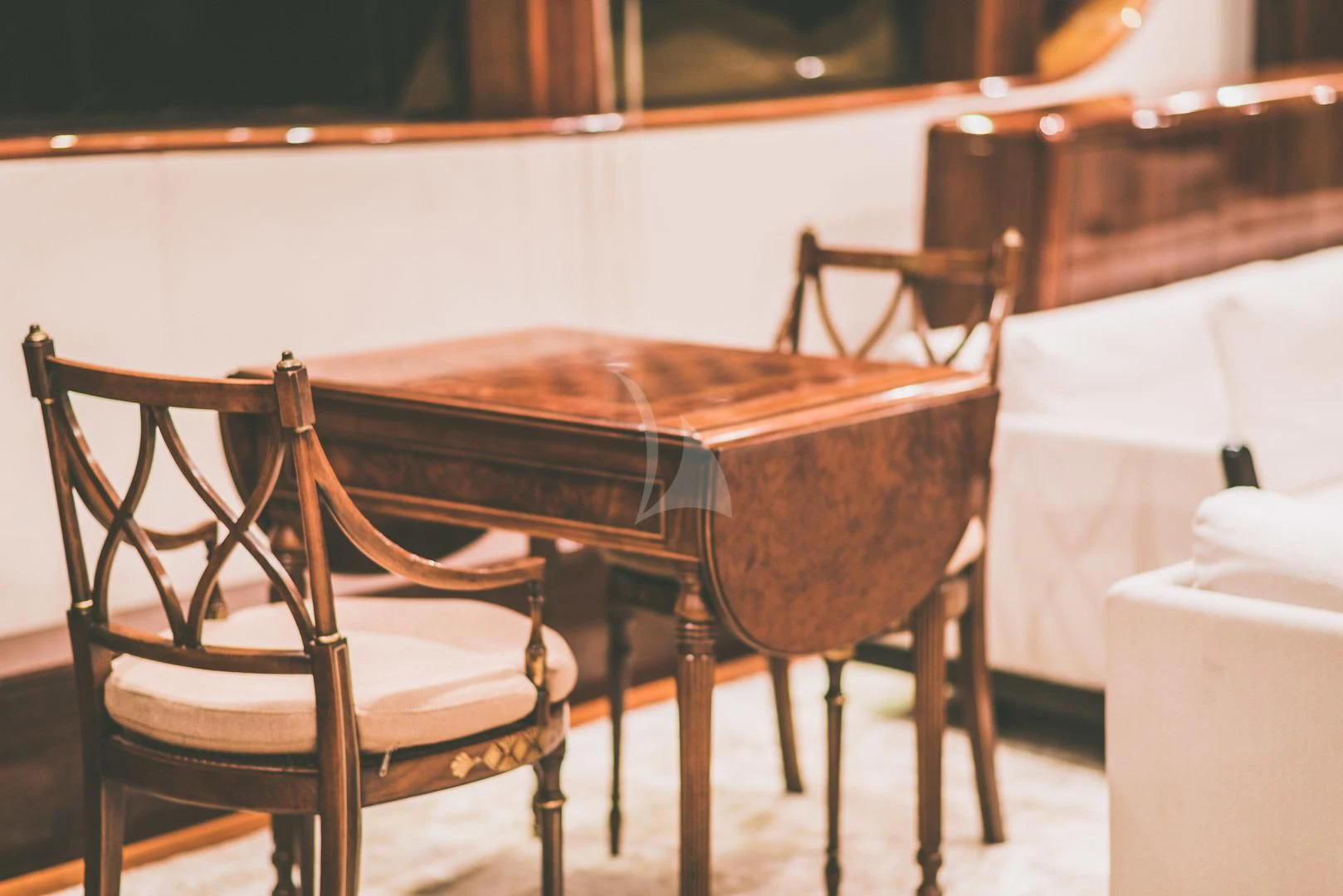 a chair and a table aboard ASHENA Yacht for Charter