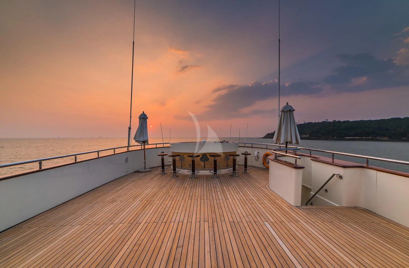 a wooden dock with a large white sailboat on it aboard ASHENA Yacht for Charter
