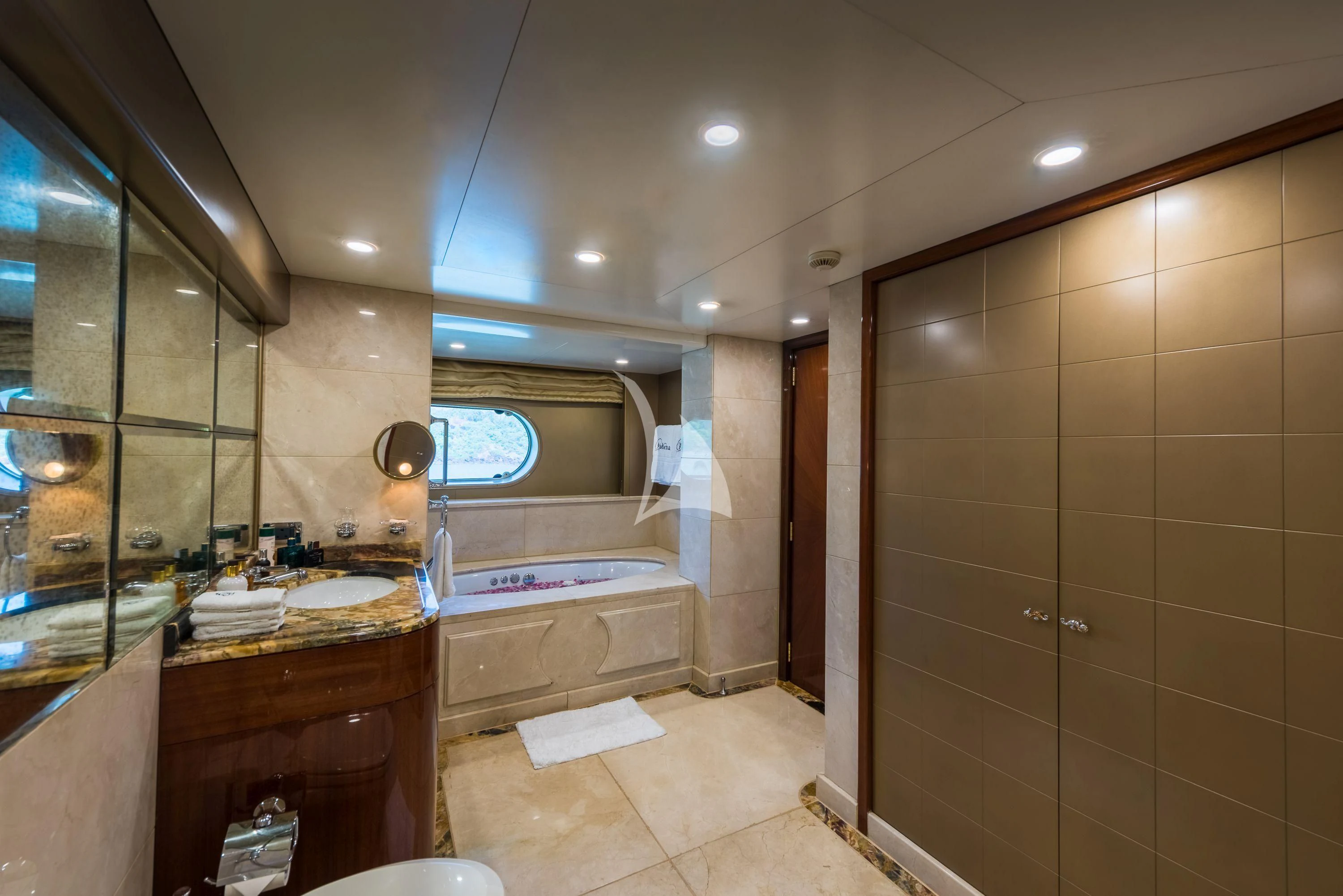 a bathroom with a large mirror aboard ASHENA Yacht for Charter