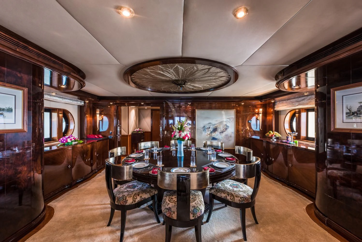 a dining room with a table and chairs aboard ASHENA Yacht for Charter