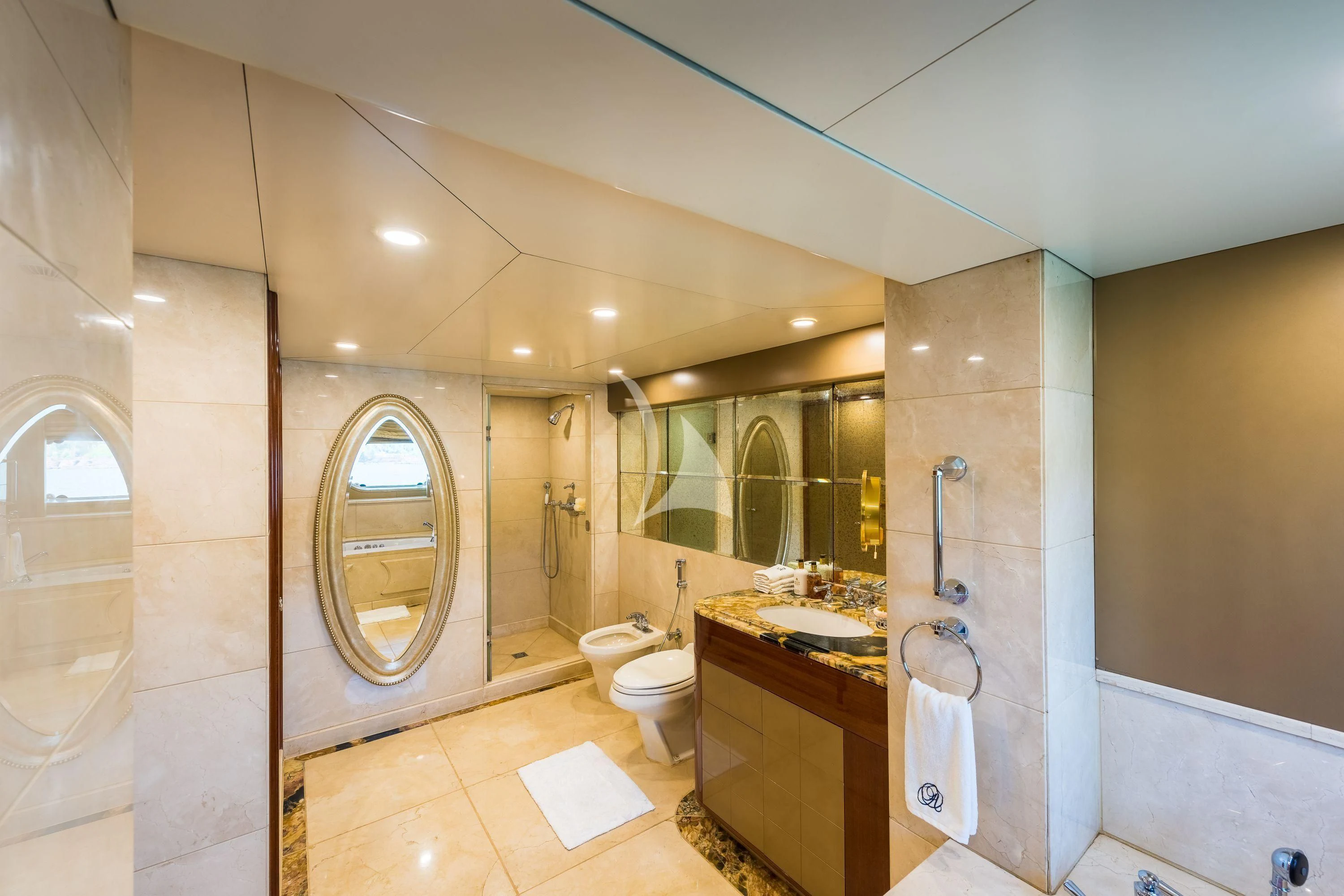 a bathroom with a large mirror aboard ASHENA Yacht for Charter
