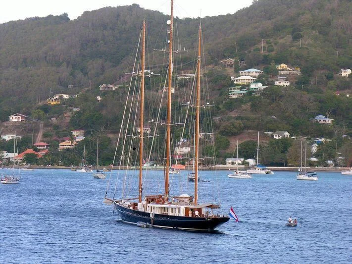 a group of boats in a harbor aboard FLEURTJE Yacht for Sale