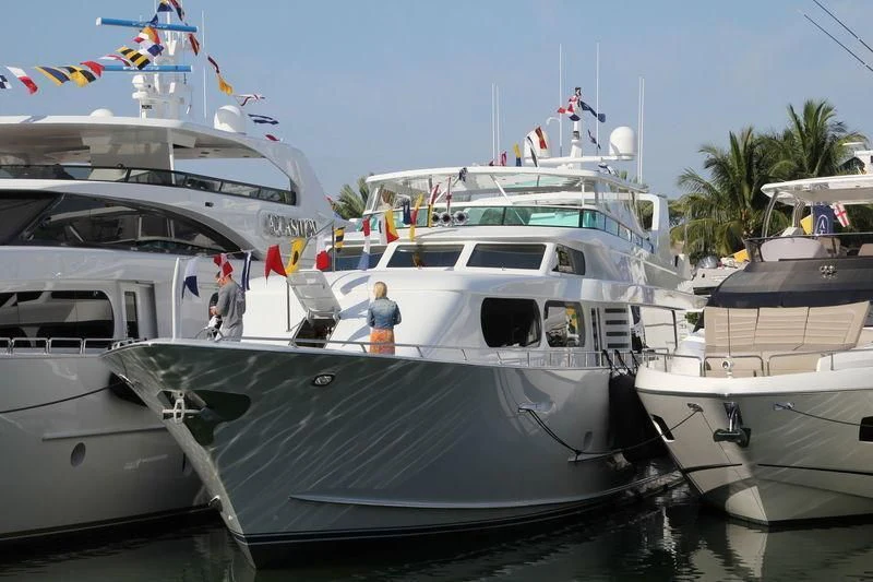 several boats docked at a pier aboard IRON LADY Yacht for Sale