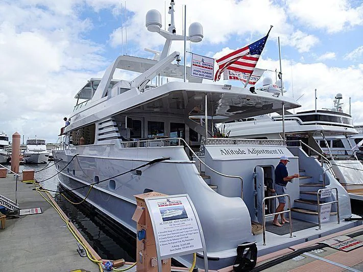 a boat docked at a pier aboard IRON LADY Yacht for Sale