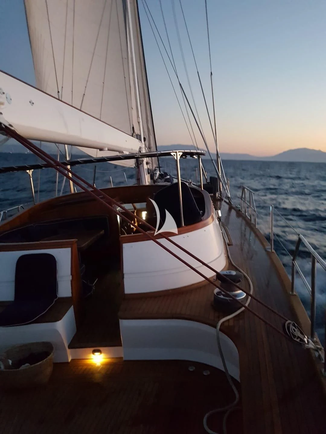 a boat on the water aboard MALIZIA Yacht for Sale