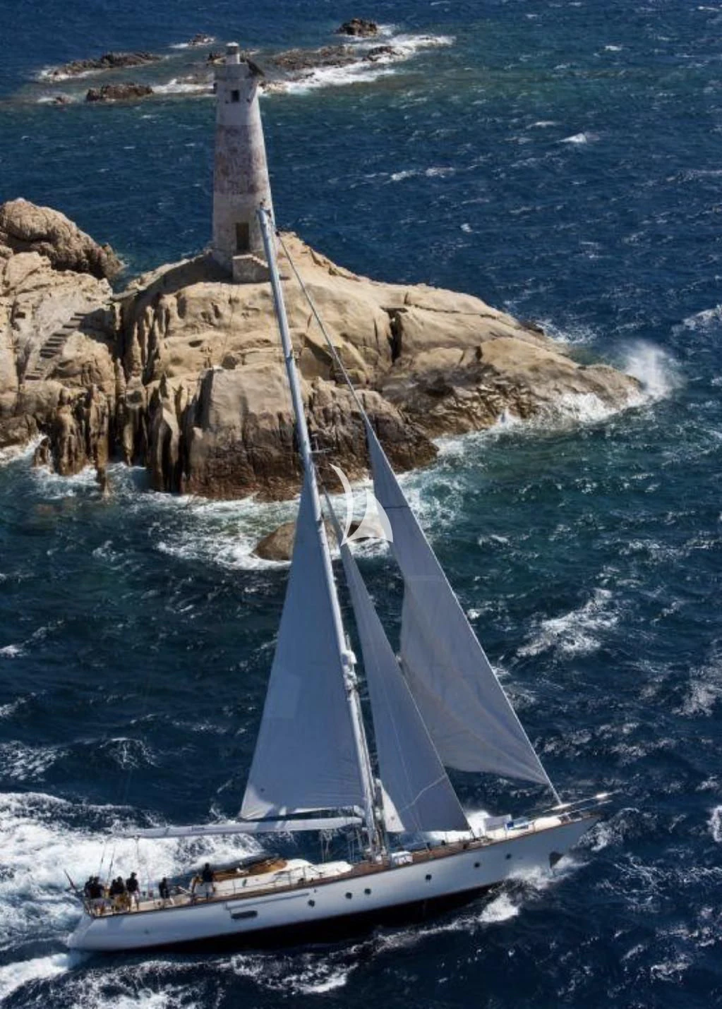 a boat sailing on the sea aboard MALIZIA Yacht for Sale