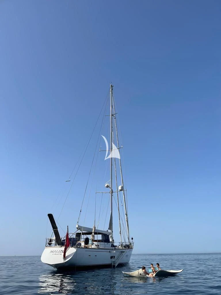 a sailboat on the water aboard MALIZIA Yacht for Sale