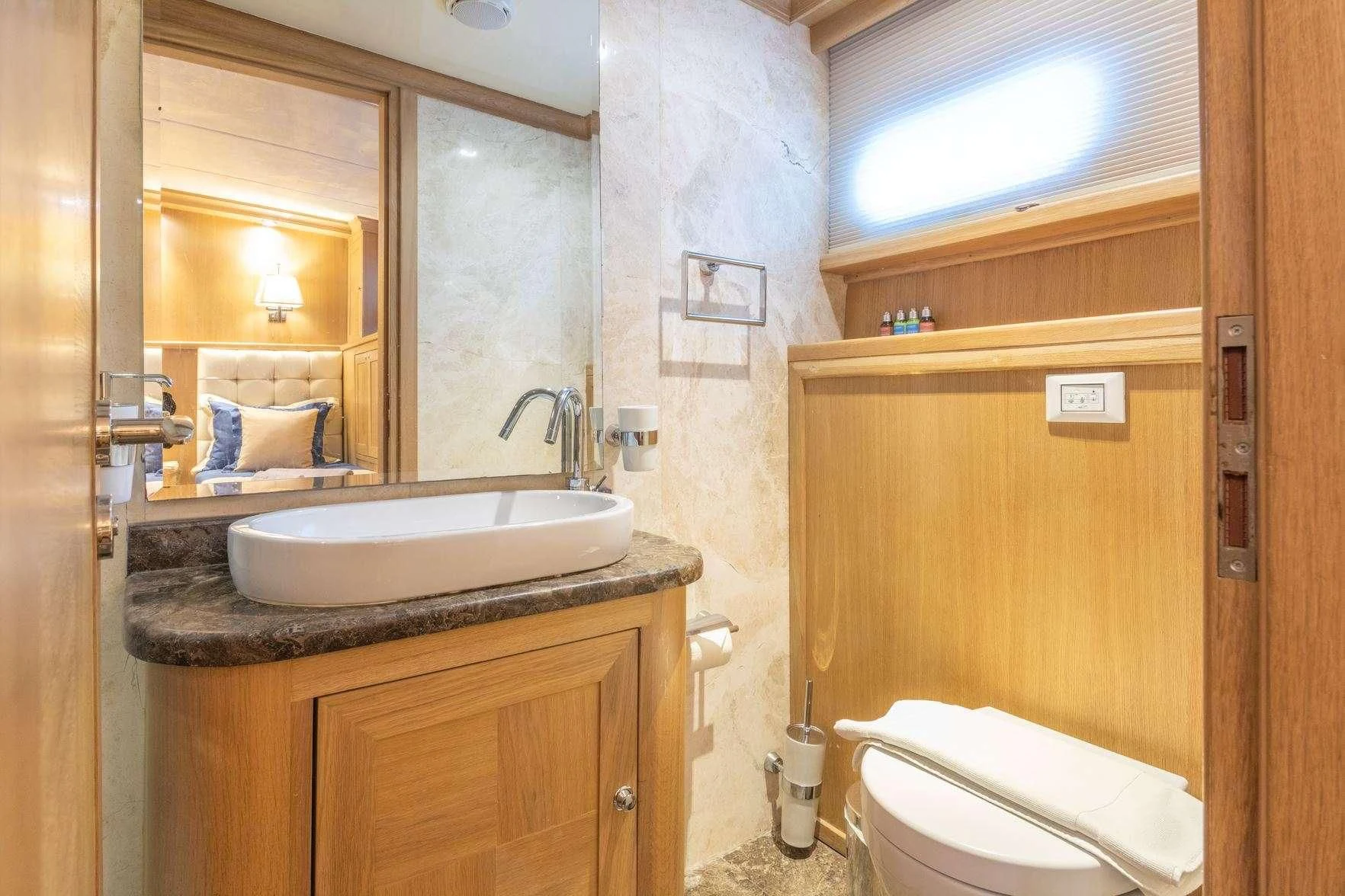 a bathroom with a sink and a toilet aboard BLUE HEAVEN Yacht for Charter