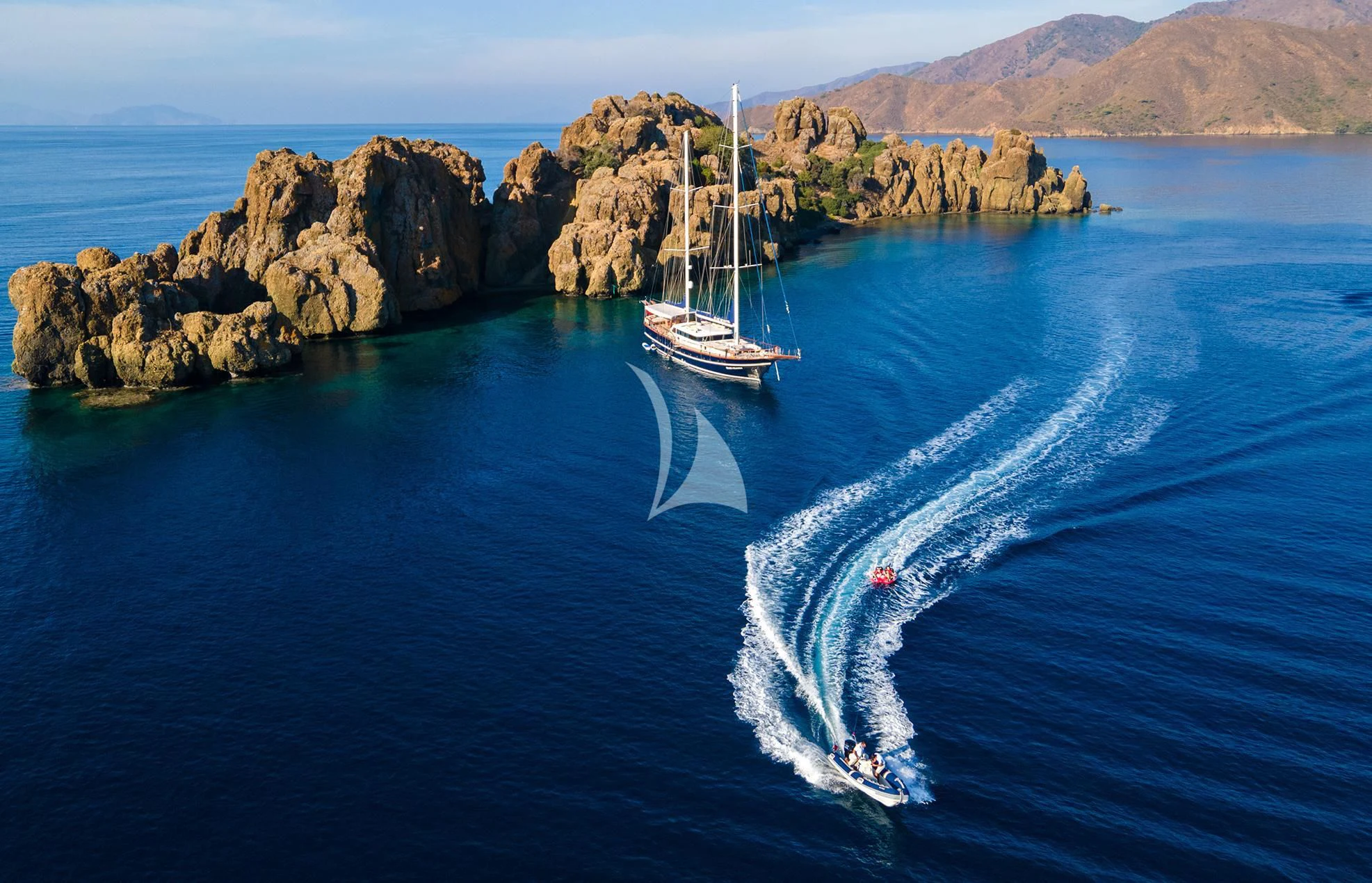 a boat sailing on the sea aboard BLUE HEAVEN Yacht for Charter
