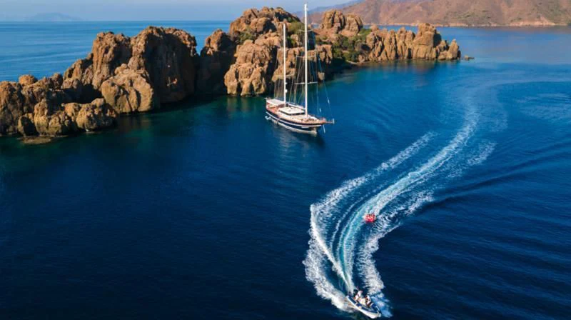 a boat sailing on the sea aboard BLUE HEAVEN Yacht for Charter