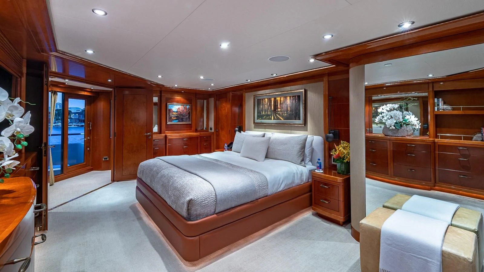 a bedroom with a bed and a desk aboard AS YOU WISH Yacht for Sale
