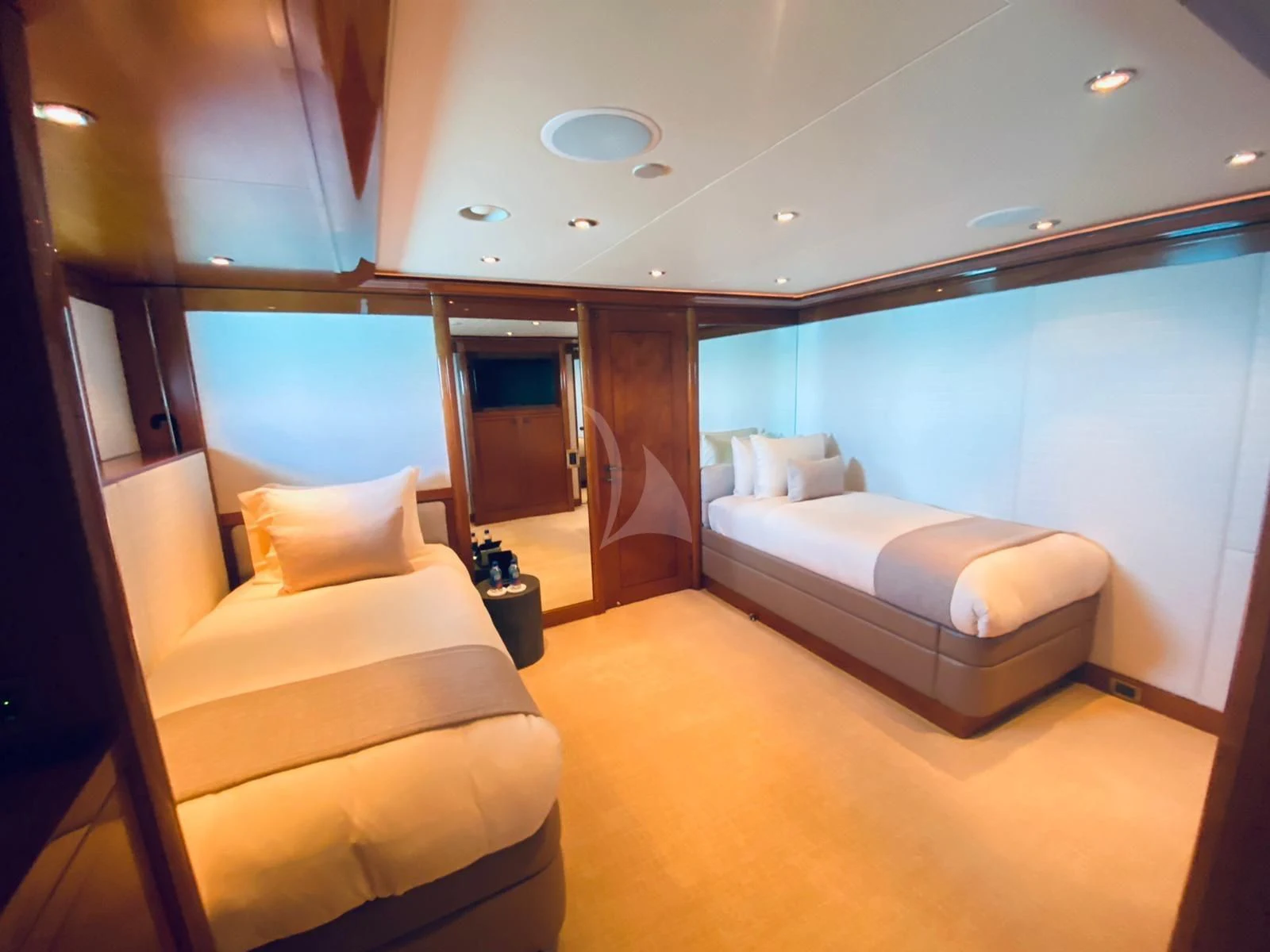 a room with a bed and a chair aboard AS YOU WISH Yacht for Sale