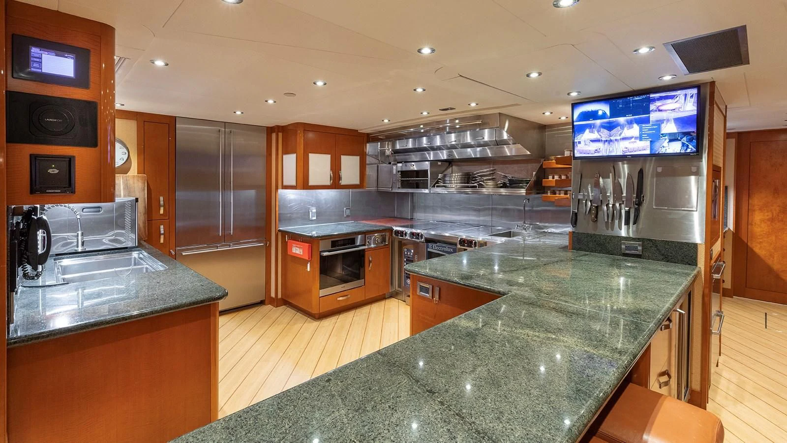 a large kitchen with a bar and bar aboard AS YOU WISH Yacht for Sale