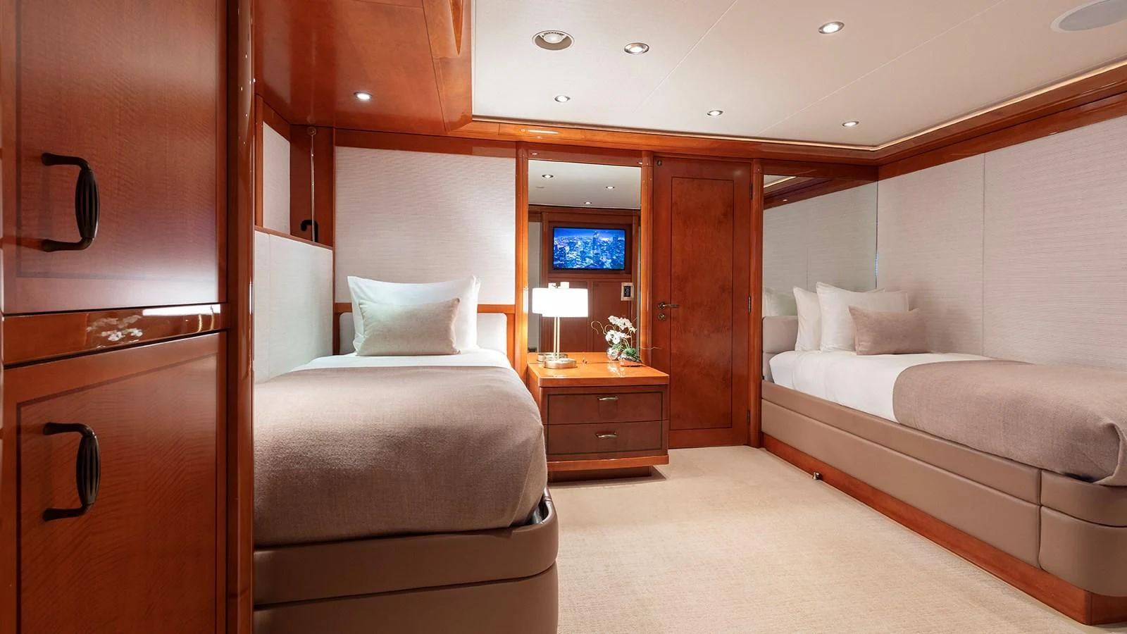 a room with a bed and a tv aboard AS YOU WISH Yacht for Sale