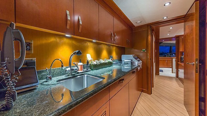 a kitchen with a large countertop aboard AS YOU WISH Yacht for Sale