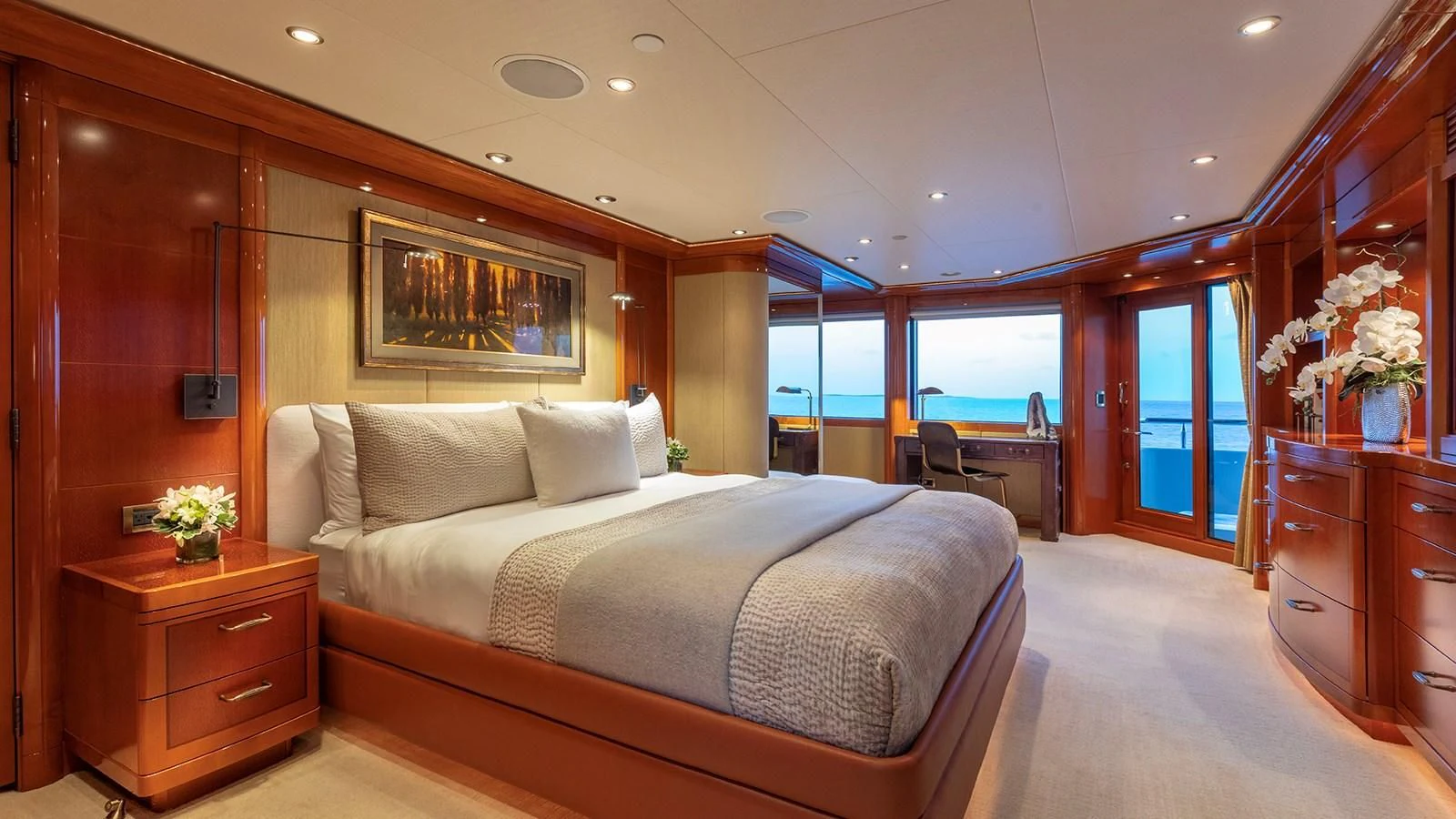 a bedroom with a bed and a desk aboard AS YOU WISH Yacht for Sale
