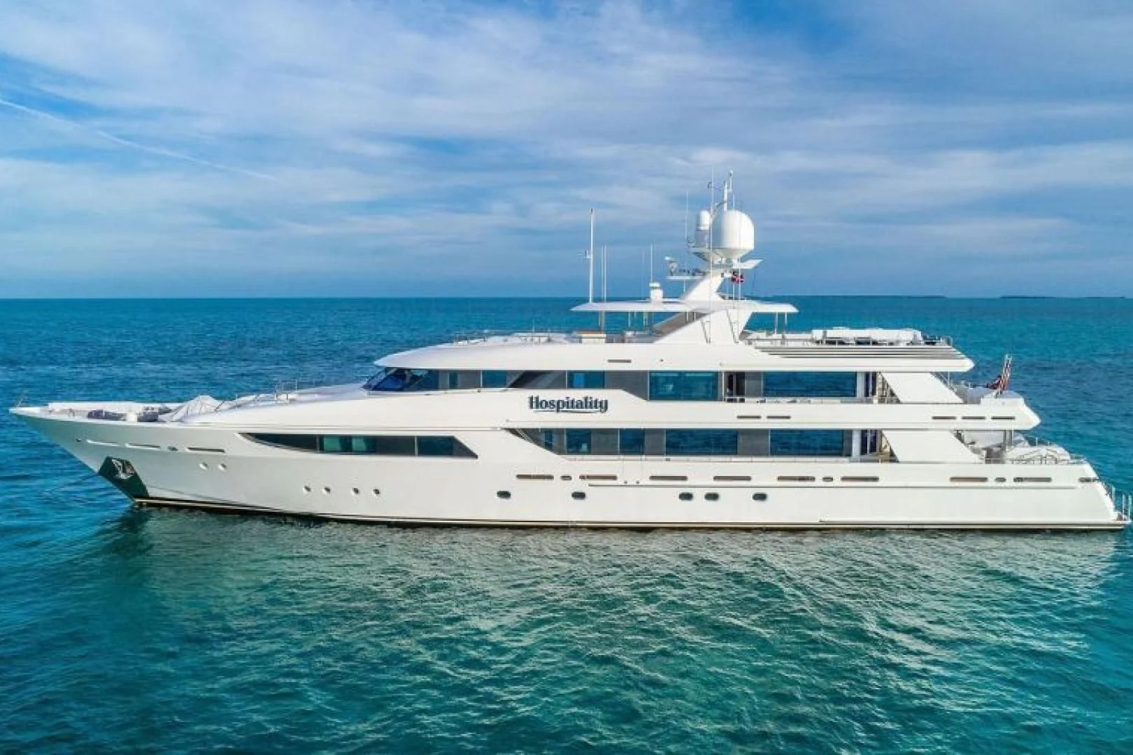a white yacht in the ocean aboard AS YOU WISH Yacht for Sale