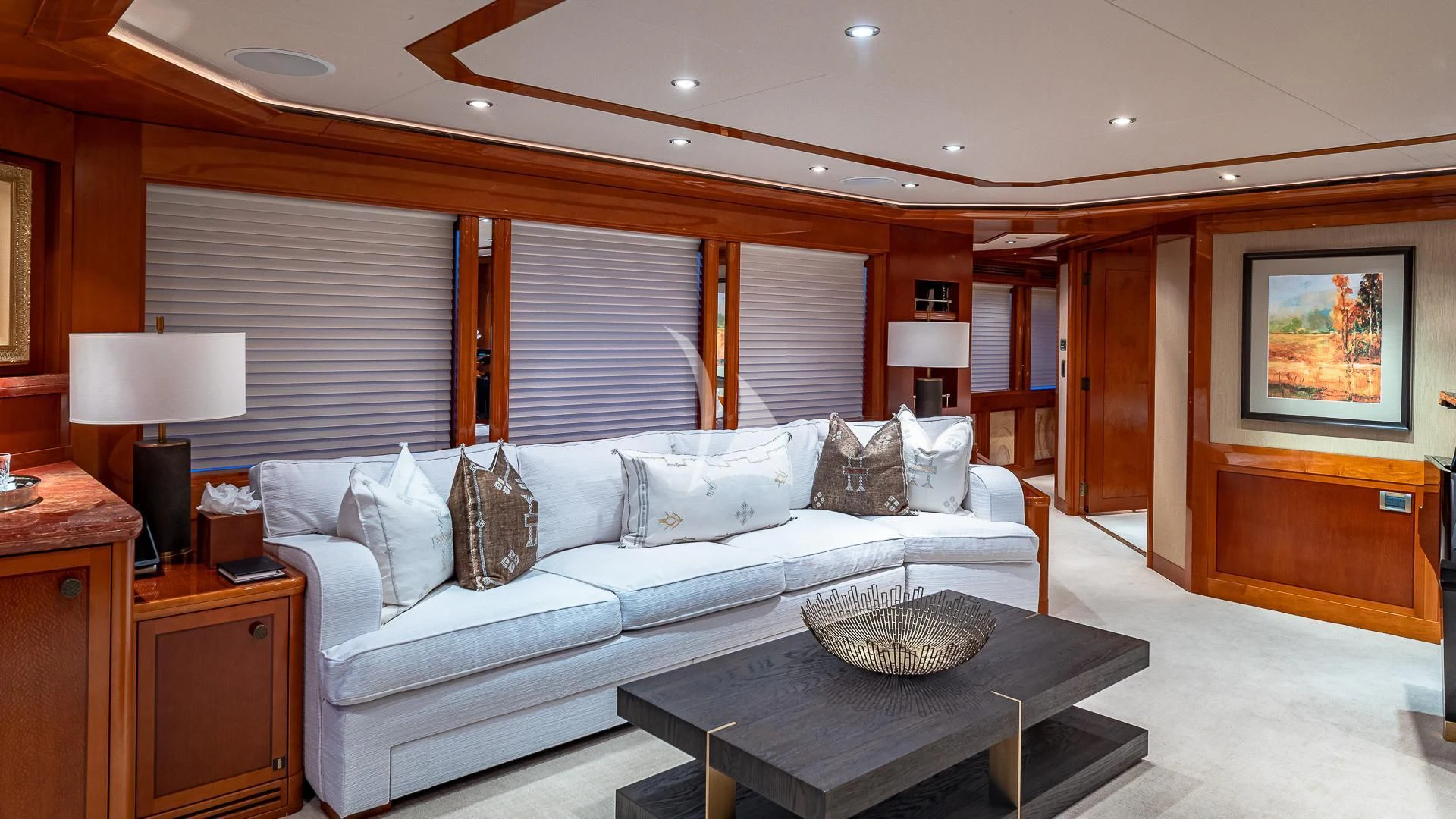 a living room with a white couch aboard AS YOU WISH Yacht for Sale
