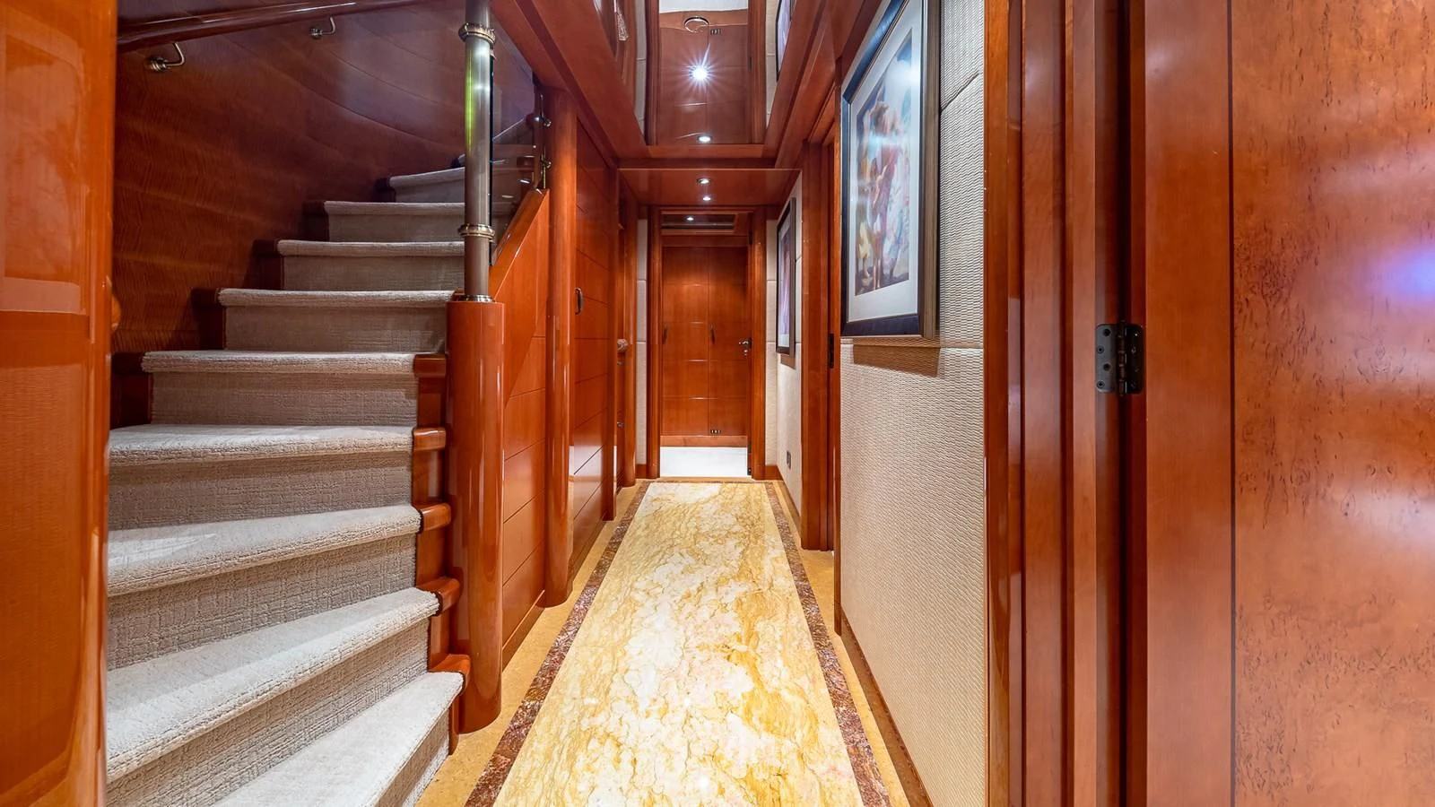 a long hallway with a staircase aboard AS YOU WISH Yacht for Sale