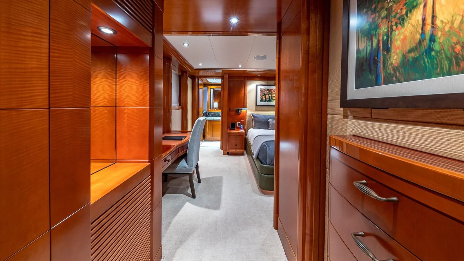 a room with a chair and a desk and a television aboard AS YOU WISH Yacht for Sale