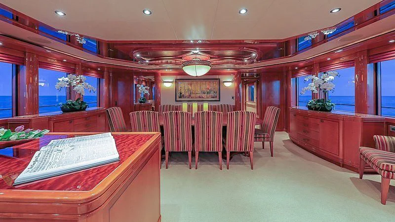 a room with a pool table and chairs aboard AS YOU WISH Yacht for Sale