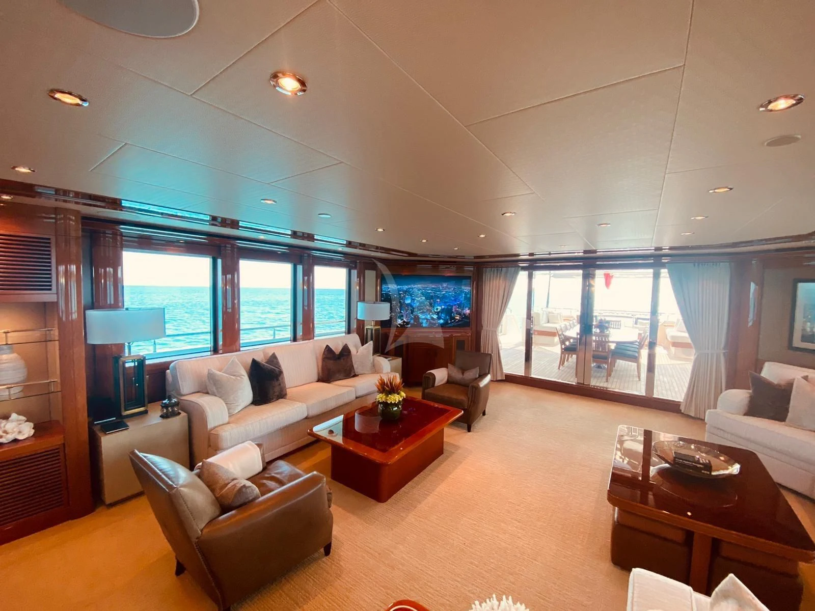 a living room with a large window aboard AS YOU WISH Yacht for Sale