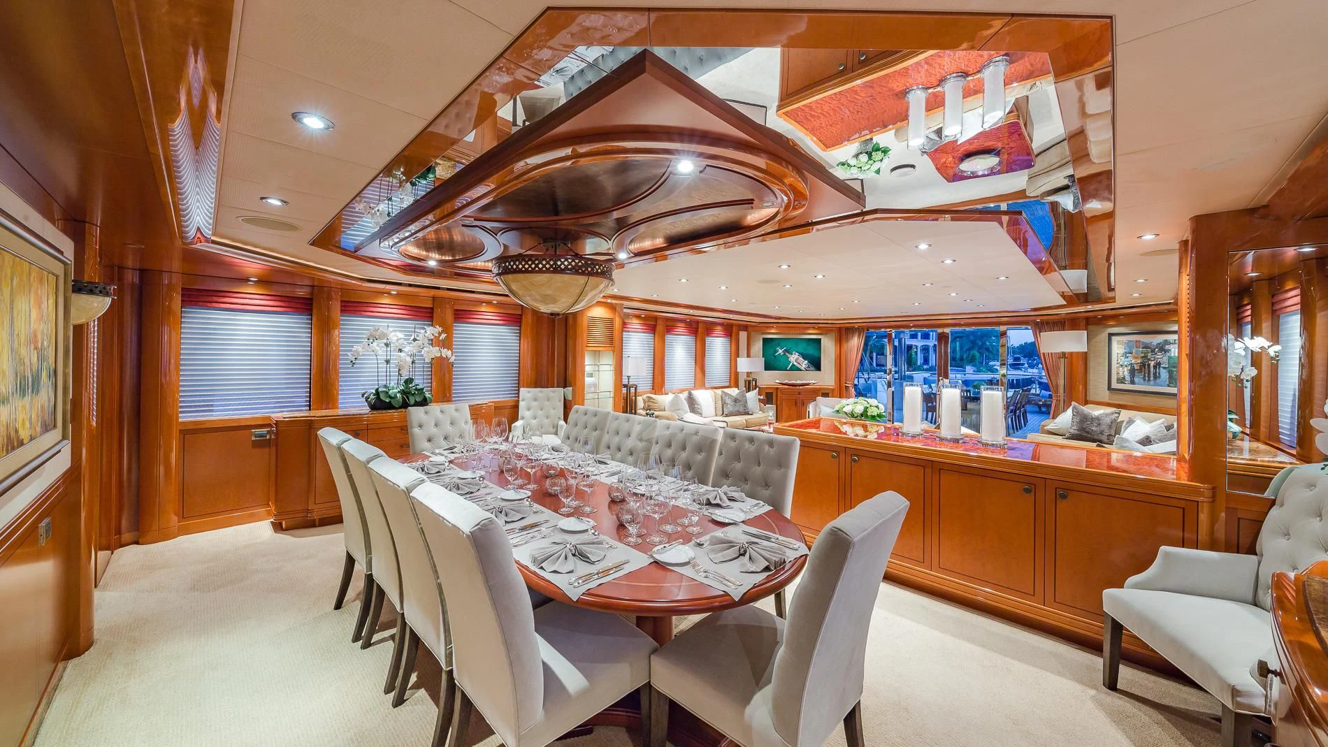 a large room with a table and chairs aboard AS YOU WISH Yacht for Sale
