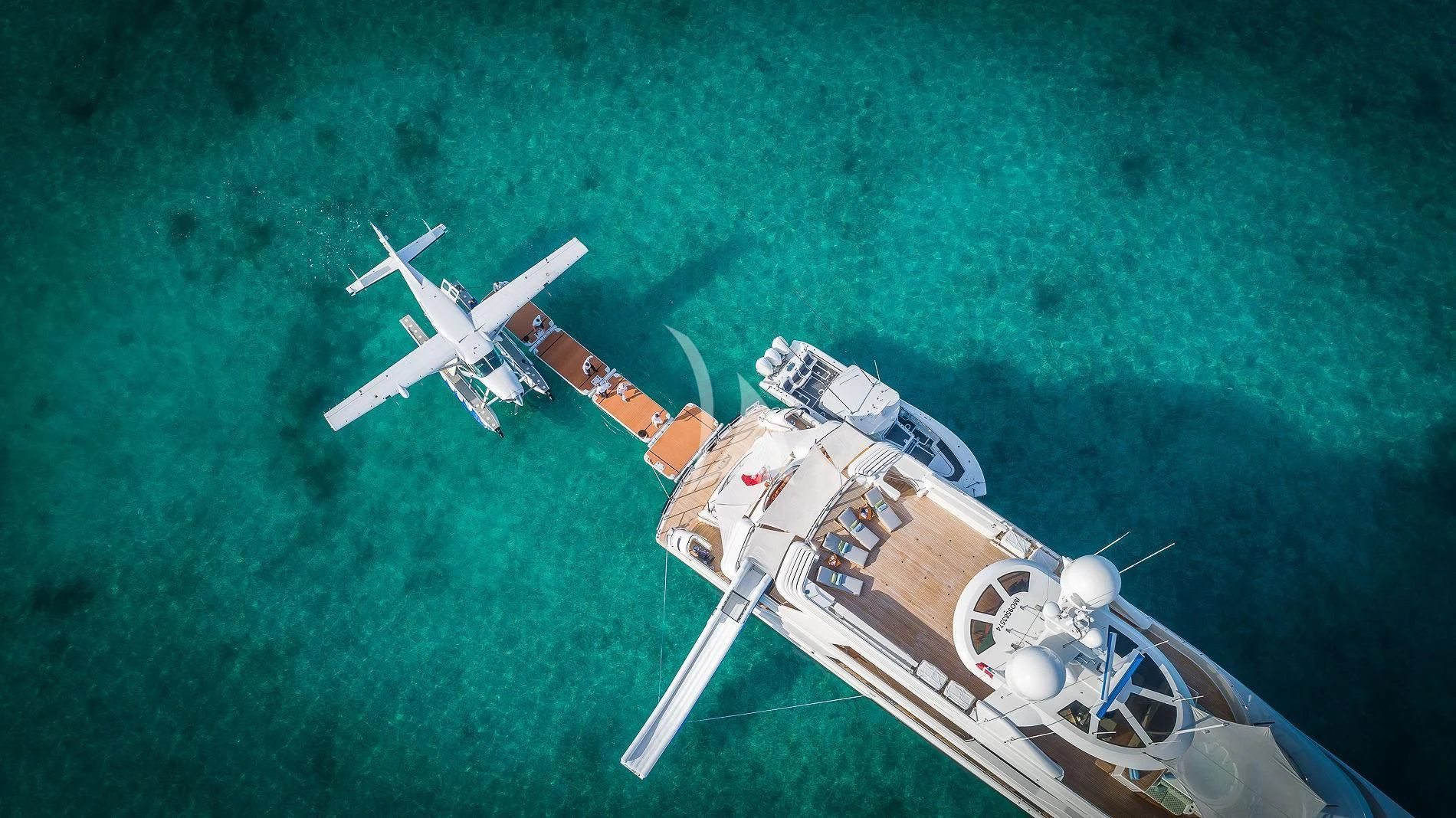a helicopter flying over a field aboard AS YOU WISH Yacht for Sale