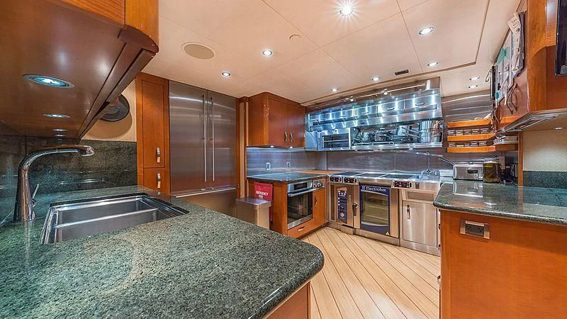 a kitchen with a large island aboard AS YOU WISH Yacht for Sale