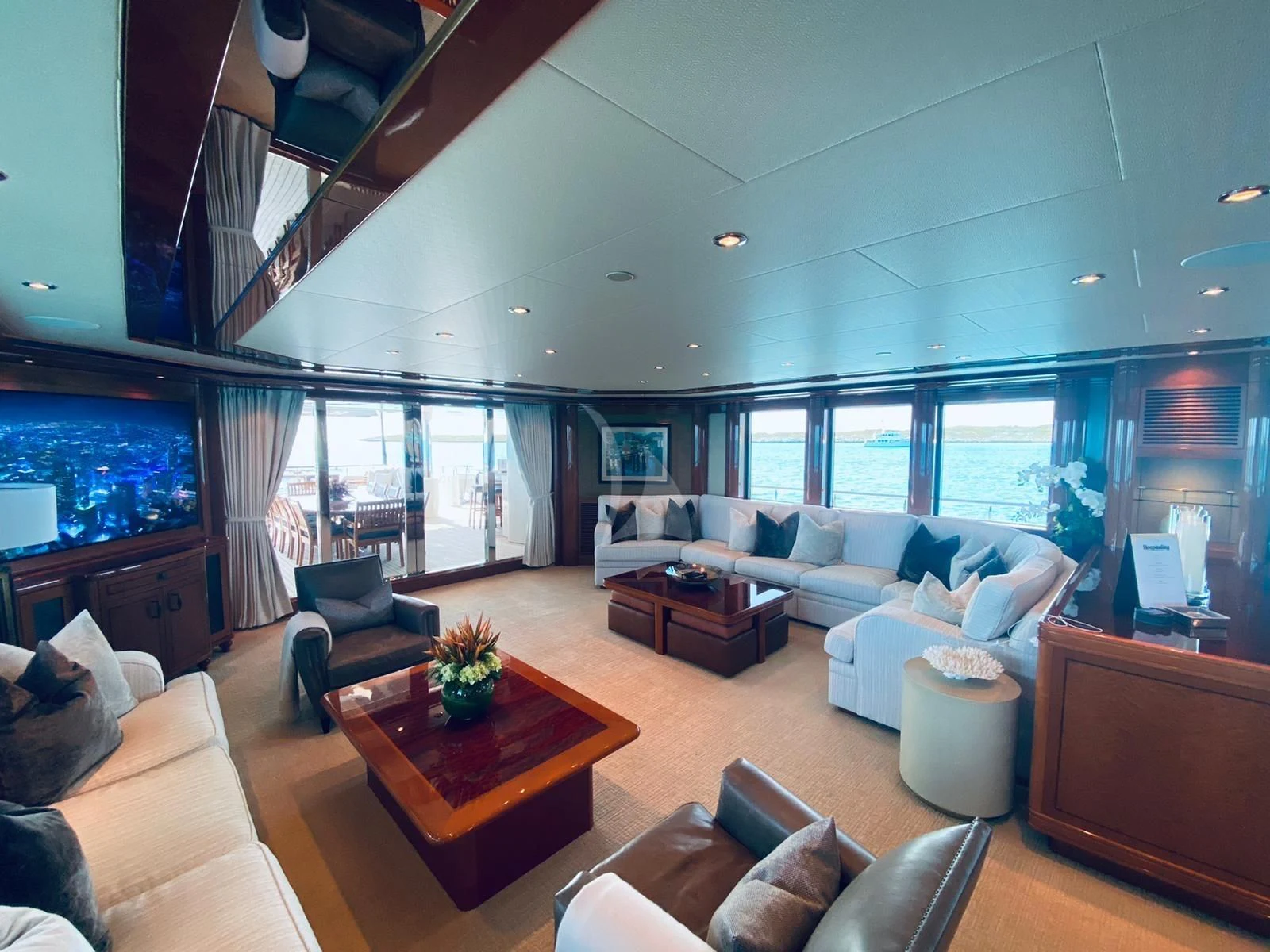 a living room with a large window aboard AS YOU WISH Yacht for Sale