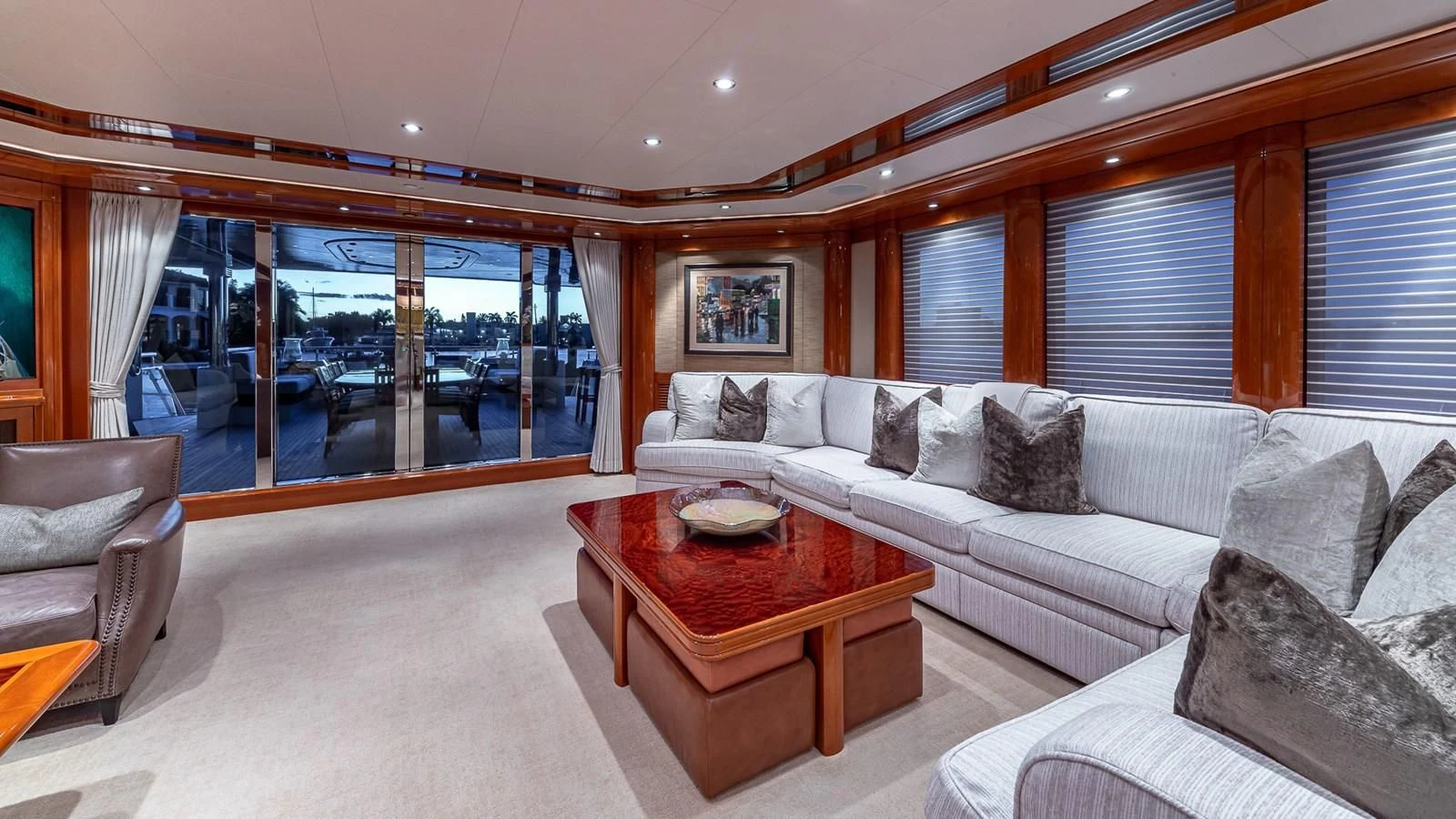 a living room with a couch and a coffee table aboard AS YOU WISH Yacht for Sale