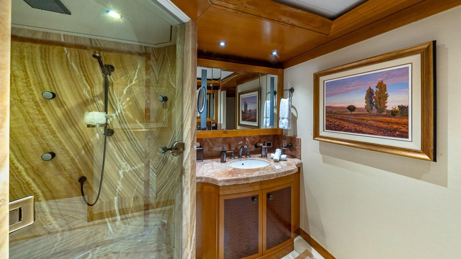 a bathroom with a glass shower aboard AS YOU WISH Yacht for Sale