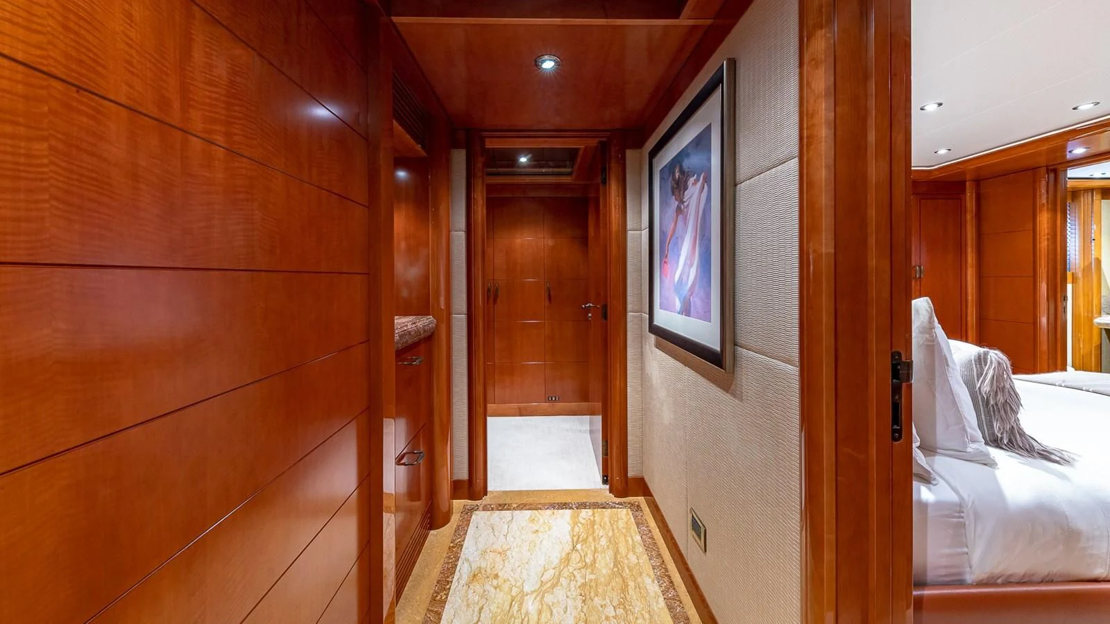 a room with a bed and a mirror aboard AS YOU WISH Yacht for Sale