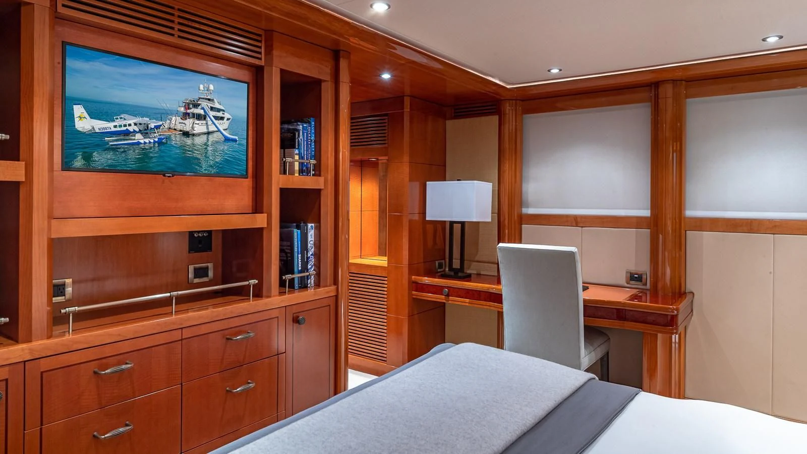 a room with a bed and a television aboard AS YOU WISH Yacht for Sale