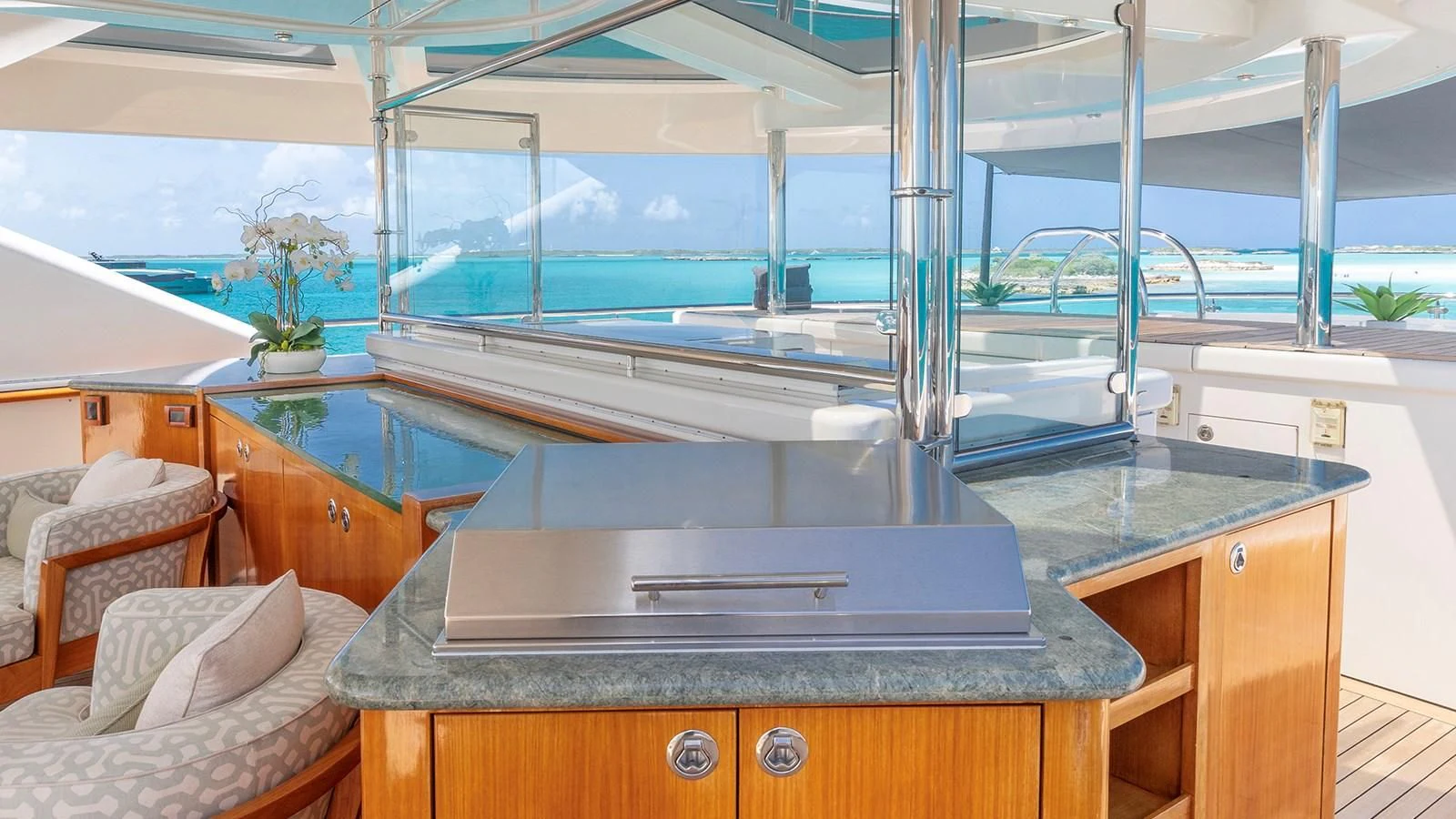 a kitchen with a large glass window aboard AS YOU WISH Yacht for Sale