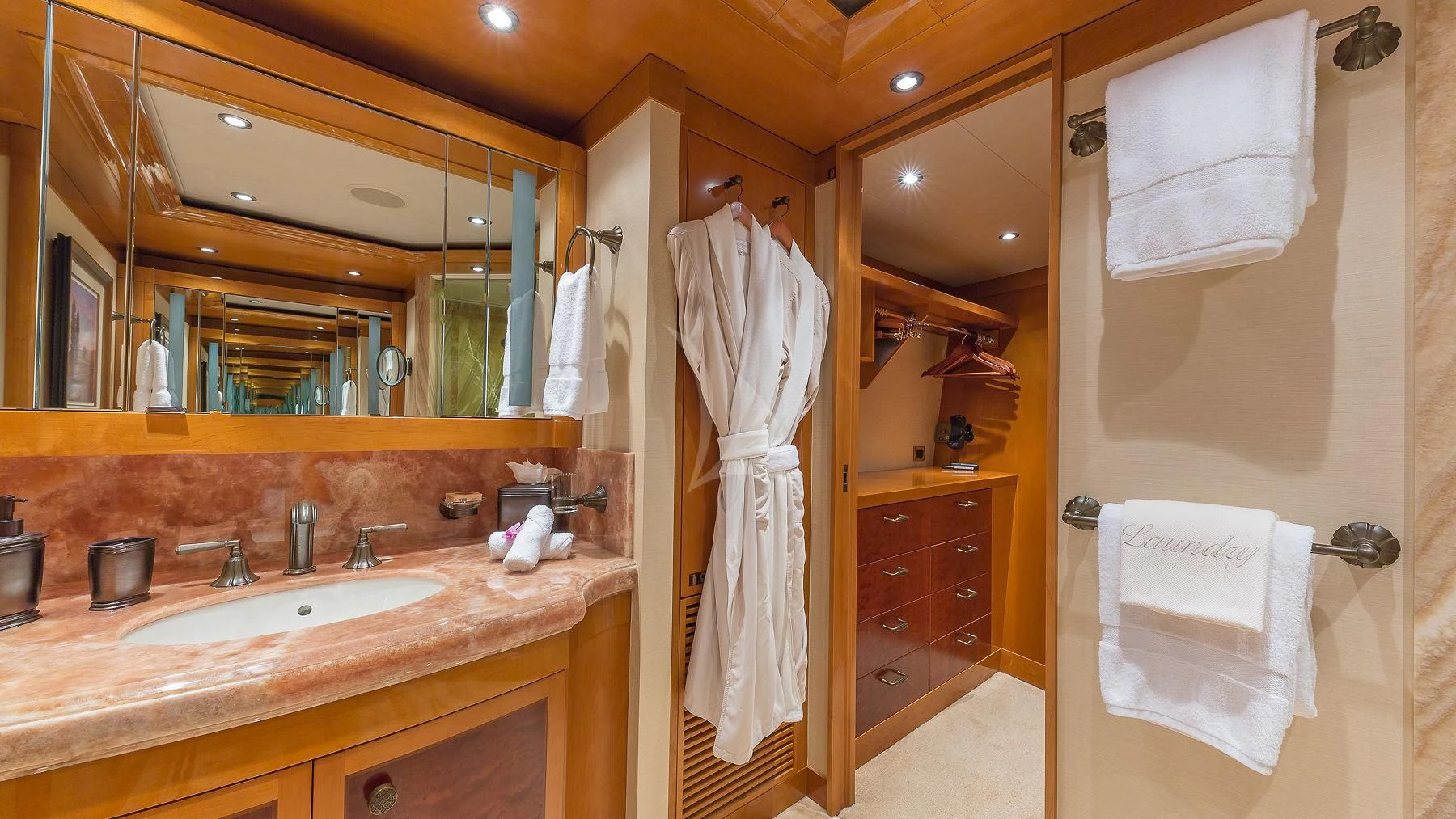a bathroom with a large mirror aboard AS YOU WISH Yacht for Sale