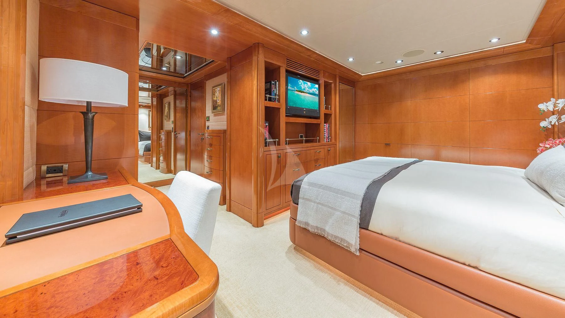 a room with a bed and a desk aboard AS YOU WISH Yacht for Sale