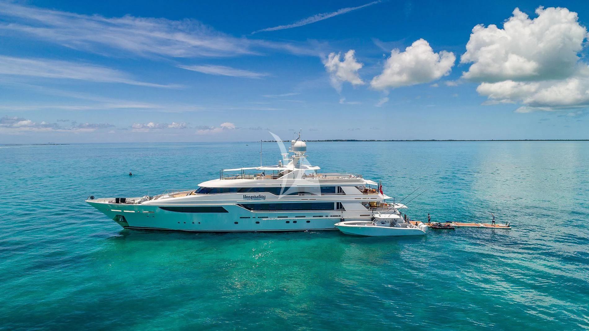 a white boat in the water aboard AS YOU WISH Yacht for Sale