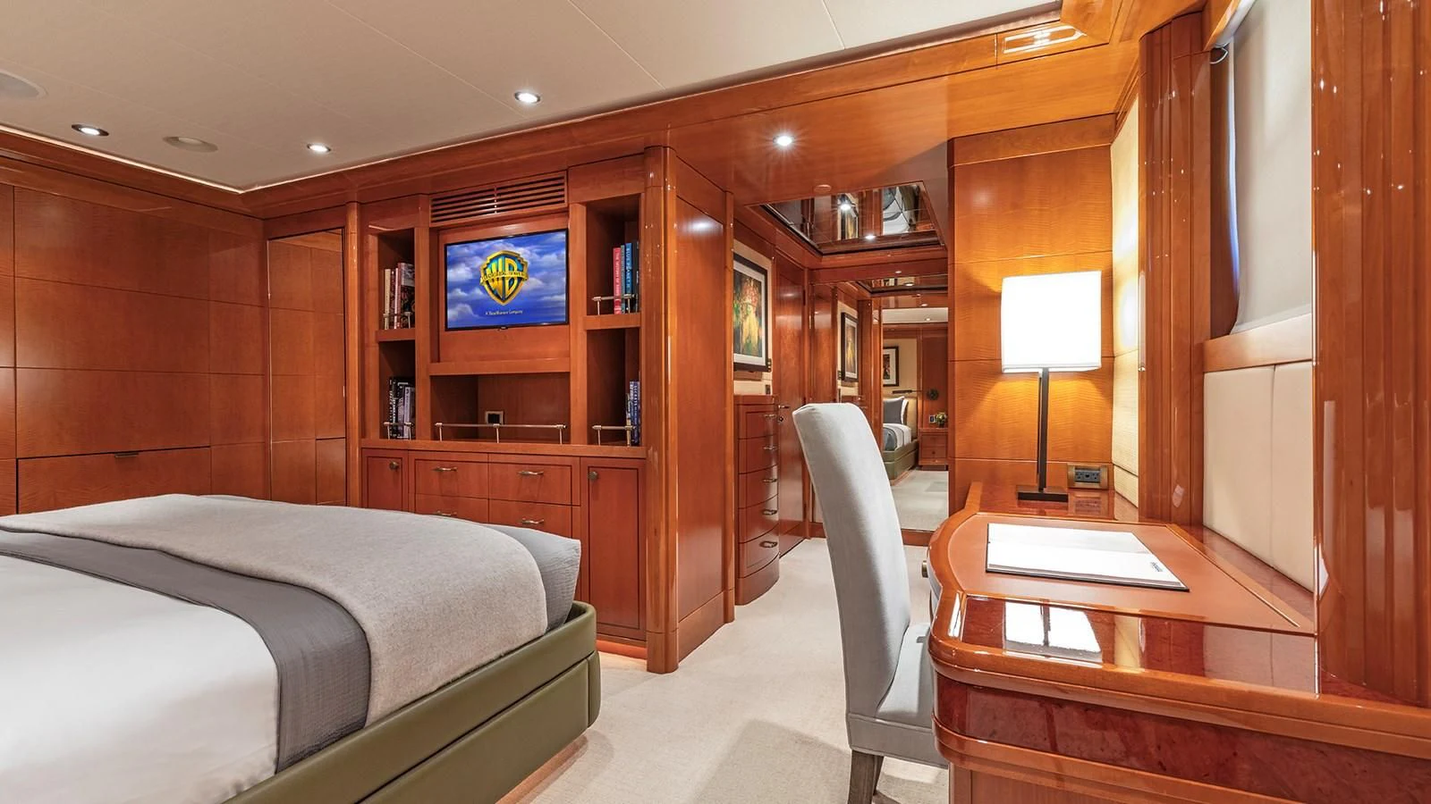 a room with a bed and a desk aboard AS YOU WISH Yacht for Sale